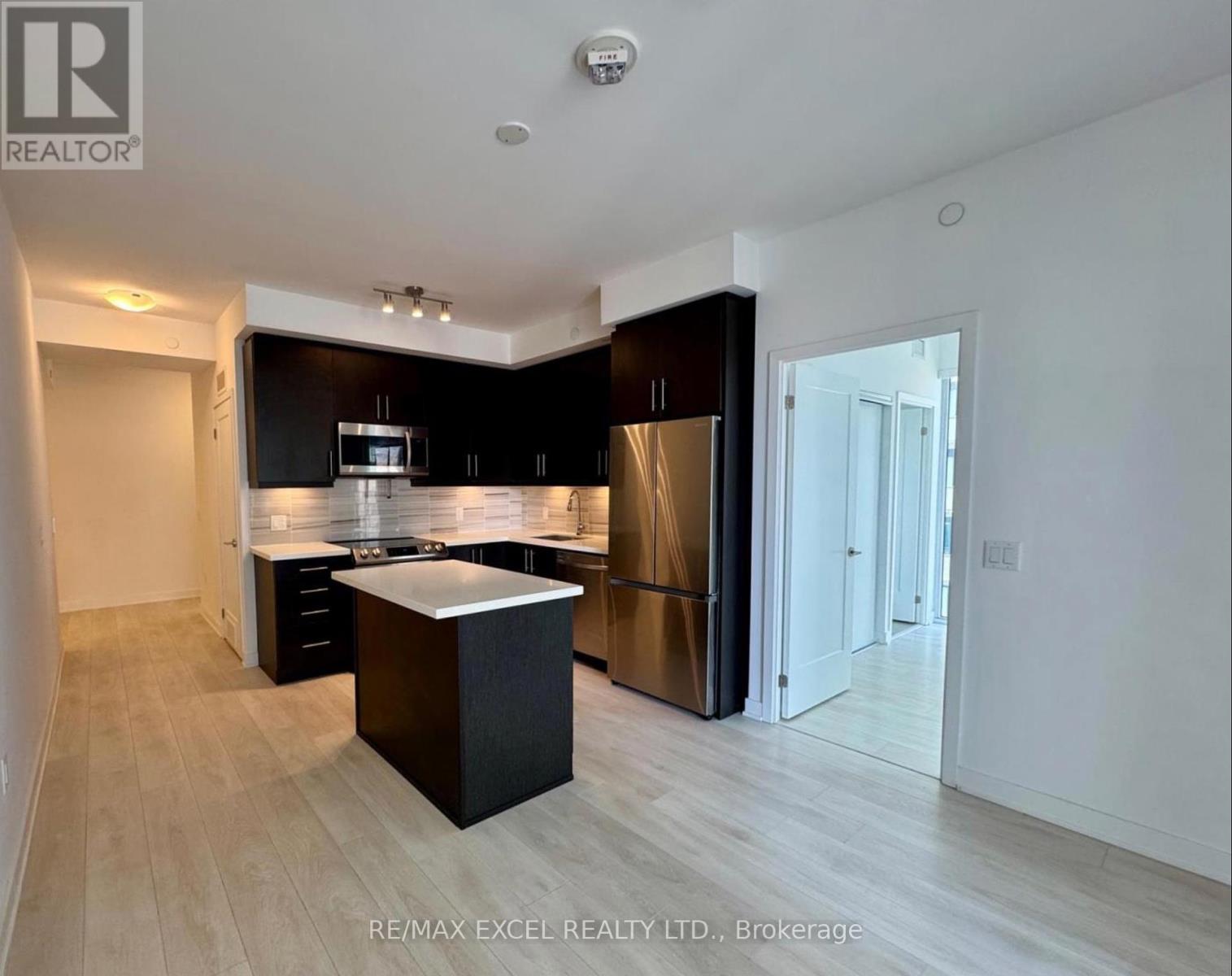 1204 - 95 Oneida Crescent, Richmond Hill, Ontario  L4B 0H5 - Photo 4 - N12454166