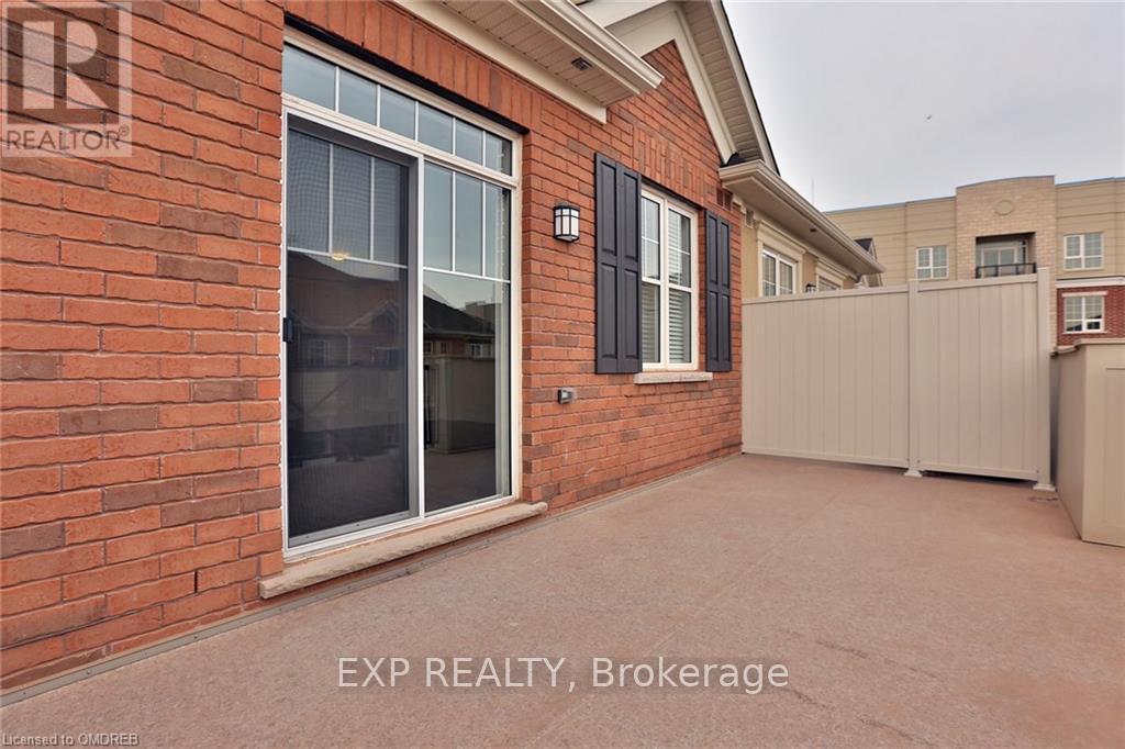 306 - 2339 Sawgrass Drive, Oakville, Ontario  L6H 7H9 - Photo 3 - W12454145