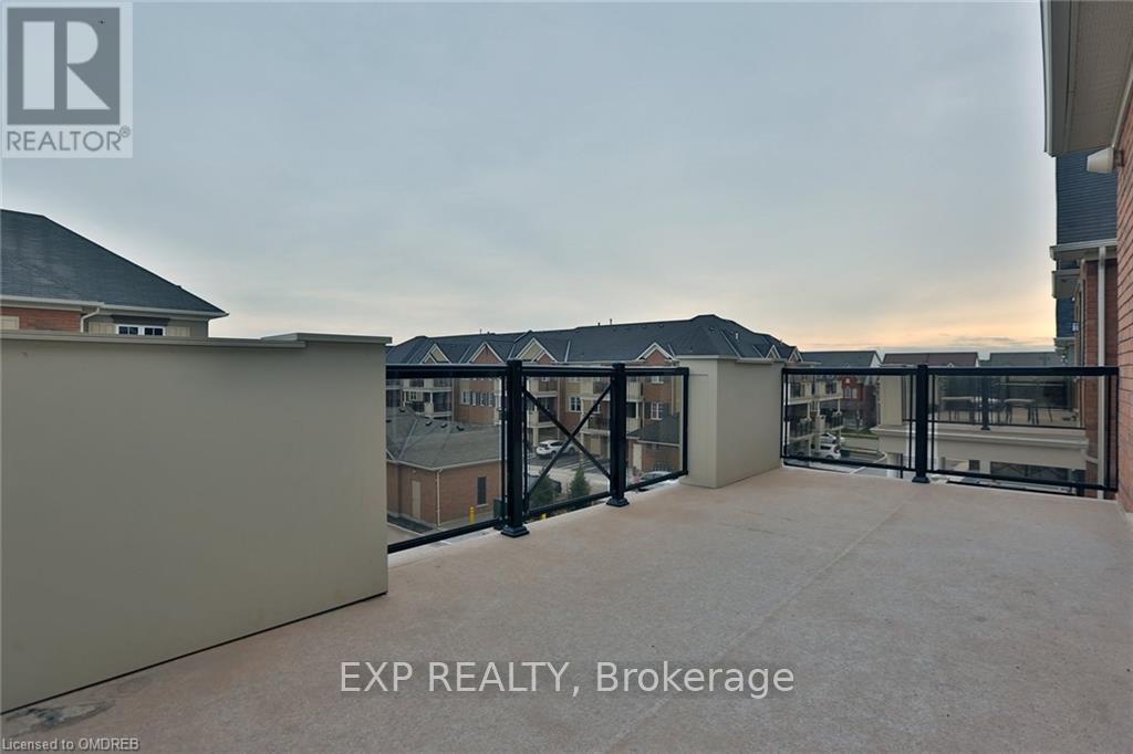 306 - 2339 Sawgrass Drive, Oakville, Ontario  L6H 7H9 - Photo 4 - W12454145