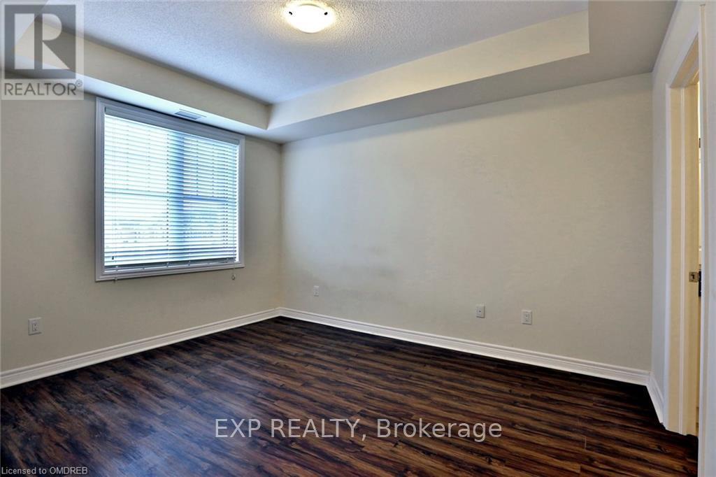 306 - 2339 Sawgrass Drive, Oakville, Ontario  L6H 7H9 - Photo 8 - W12454145