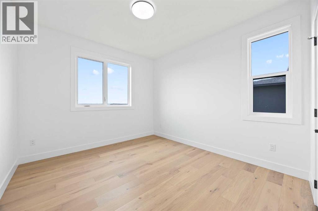 9 Eaton Terrace, Rural Rocky View County, Alberta  T1Z 0A1 - Photo 39 - A2245775