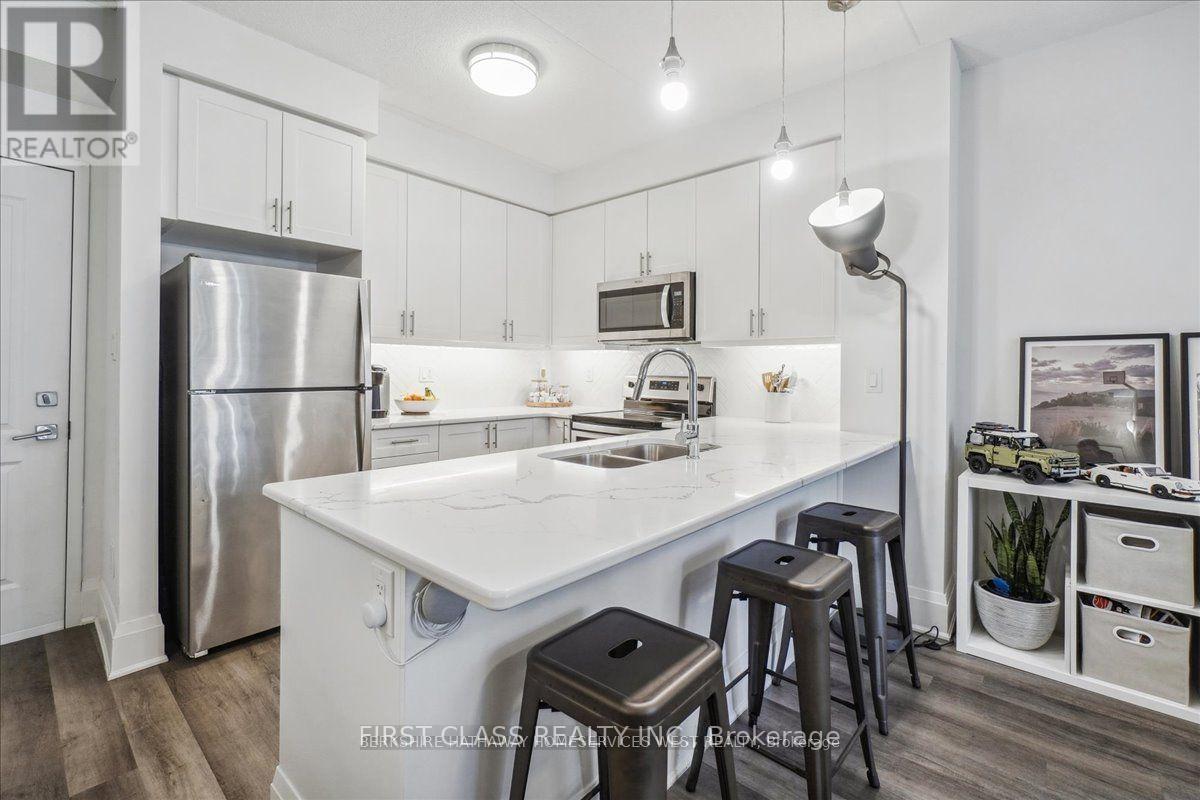 104 - 610 Farmstead Drive, Milton, Ontario  L9T 8X5 - Photo 4 - W12454255