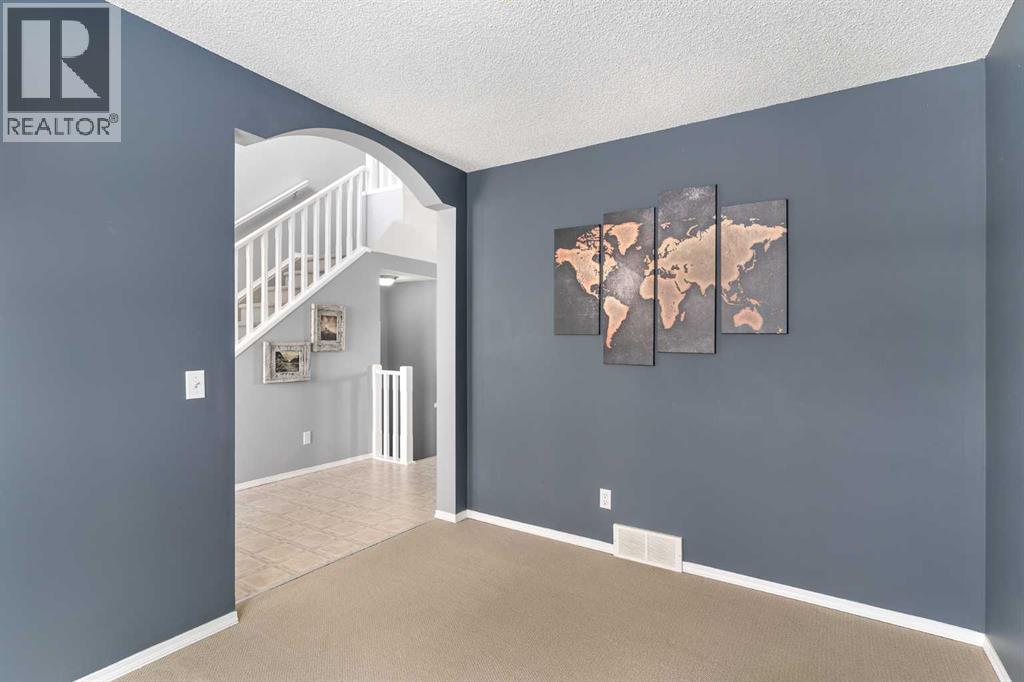 14 Tuscany Springs Rise Nw, Calgary, Alberta  T3L 2S2 - Photo 4 - A2233060