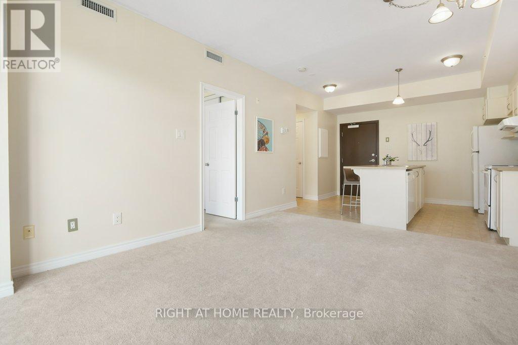 303 - 200 Glenroy Gilbert Drive, Ottawa, Ontario  K2J 5W2 - Photo 11 - X12454607