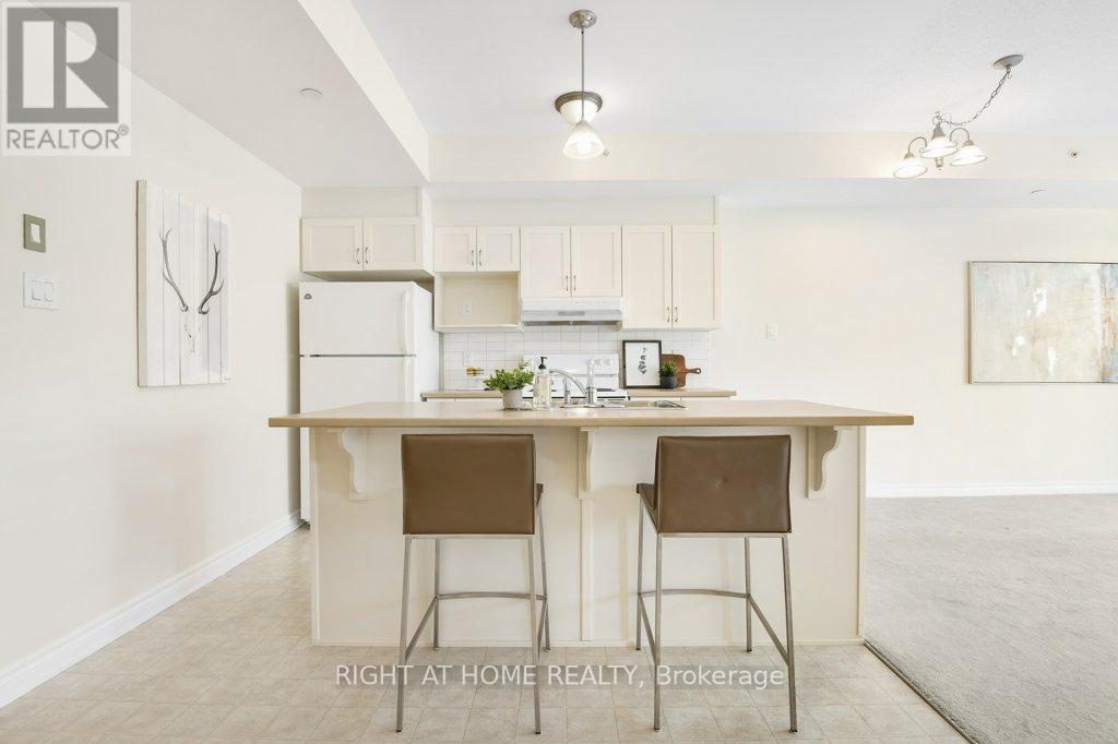 303 - 200 Glenroy Gilbert Drive, Ottawa, Ontario  K2J 5W2 - Photo 12 - X12454607