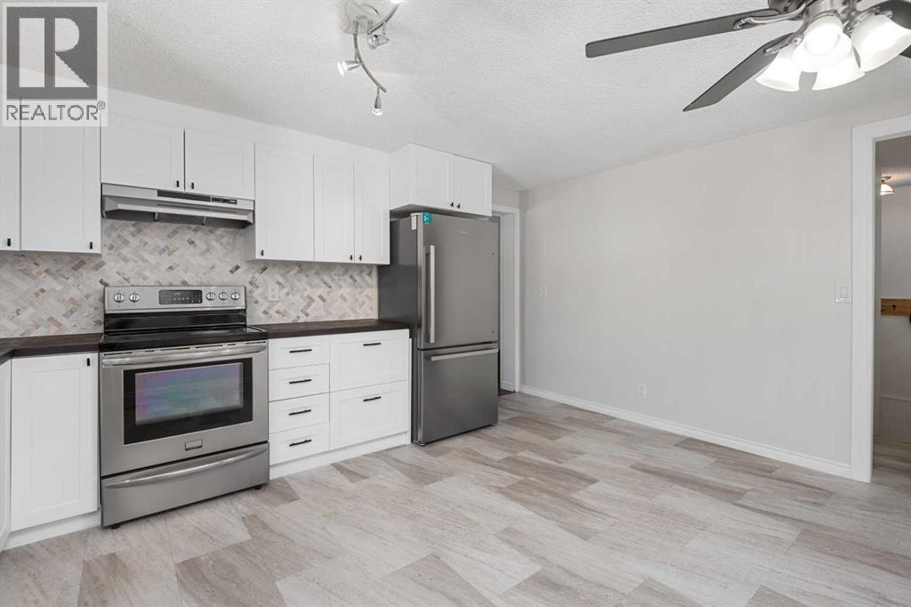 153 Big Hill Place Se, Airdrie, Alberta  T4A 1P9 - Photo 4 - A2260030