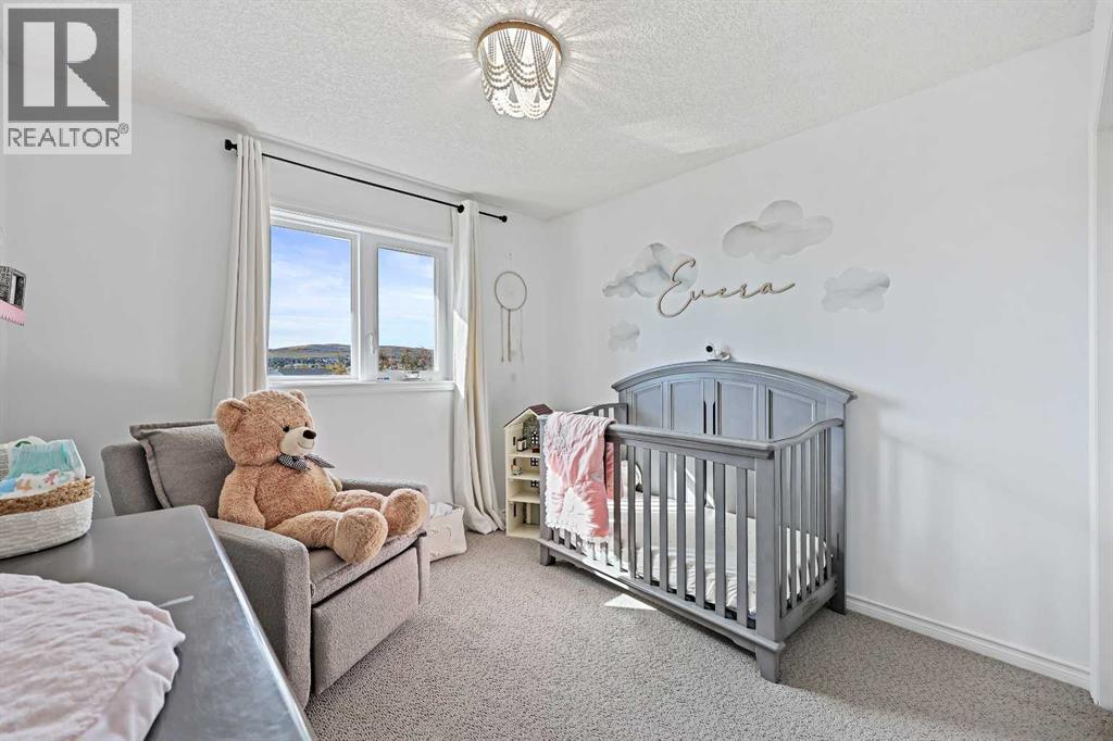 52 West Edge Road, Cochrane, Alberta  T4C 1L1 - Photo 25 - A2262912