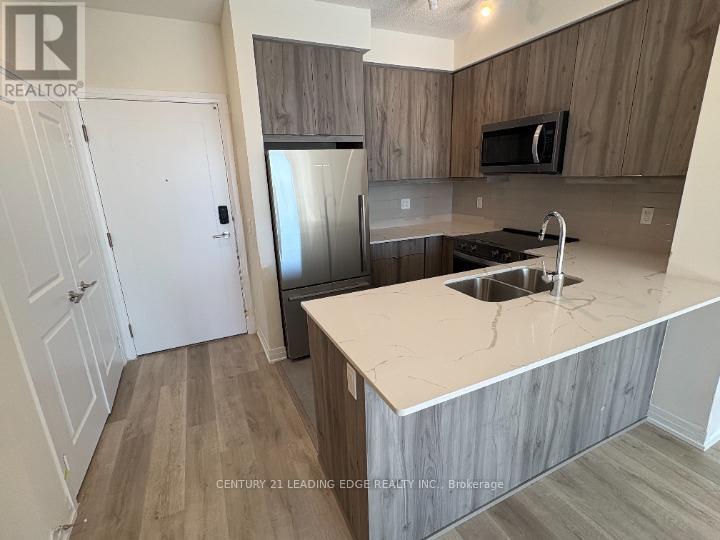 1103 - 15 Watergarden Drive, Mississauga, Ontario  L5R 1B2 - Photo 2 - W12454768
