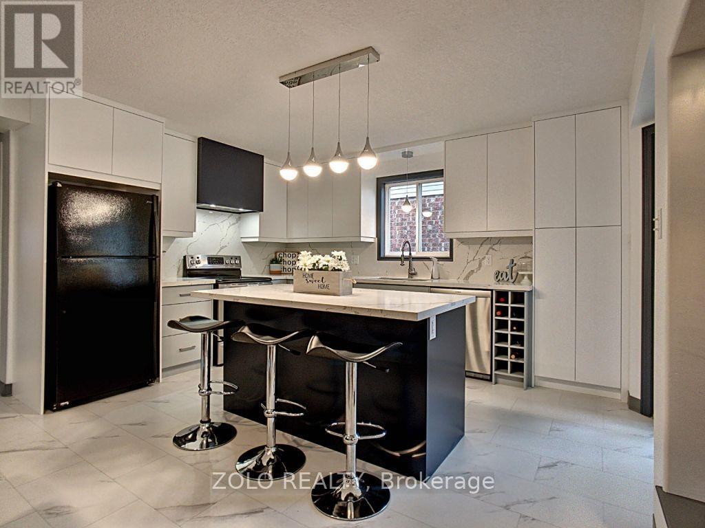 165 Windflower Drive, Kitchener, Ontario  N2E 3S9 - Photo 6 - X12454695