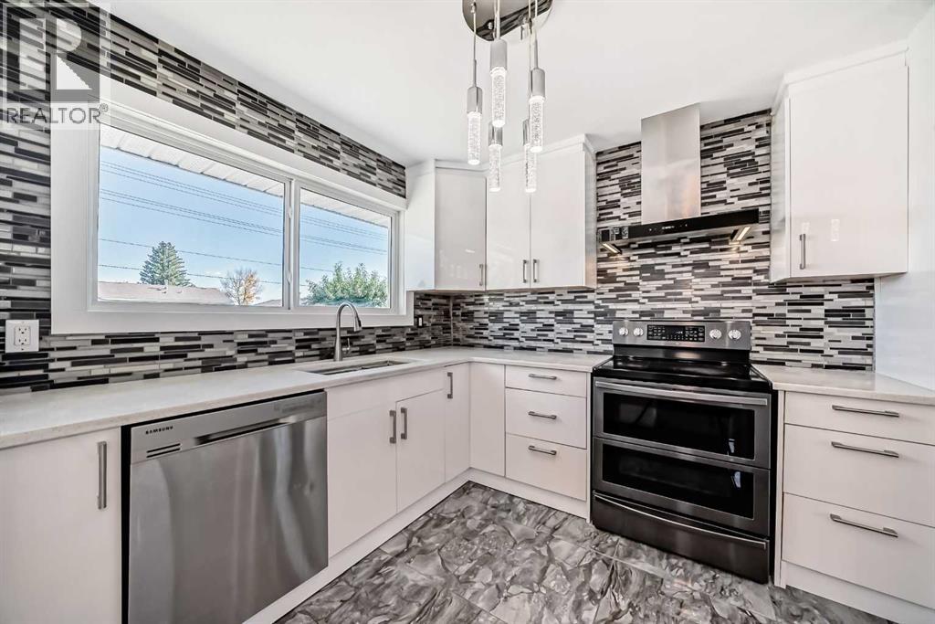 6082 Madigan Drive Ne, Calgary, Alberta  T2A 5B8 - Photo 7 - A2262498