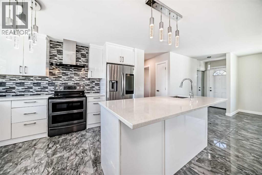 6082 Madigan Drive Ne, Calgary, Alberta  T2A 5B8 - Photo 6 - A2262498
