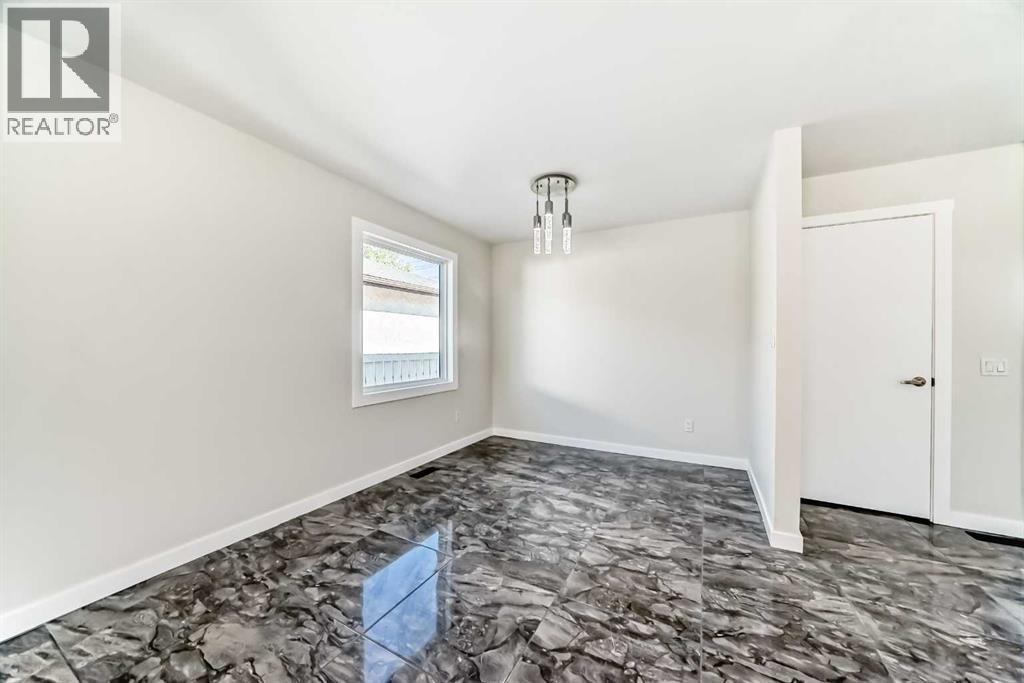 6082 Madigan Drive Ne, Calgary, Alberta  T2A 5B8 - Photo 8 - A2262498