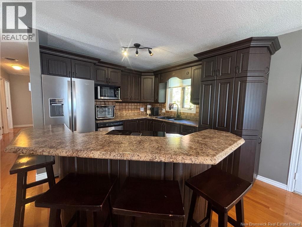 1027 Rue Hache, Beresford, New Brunswick  E8K 1H9 - Photo 30 - NB128277