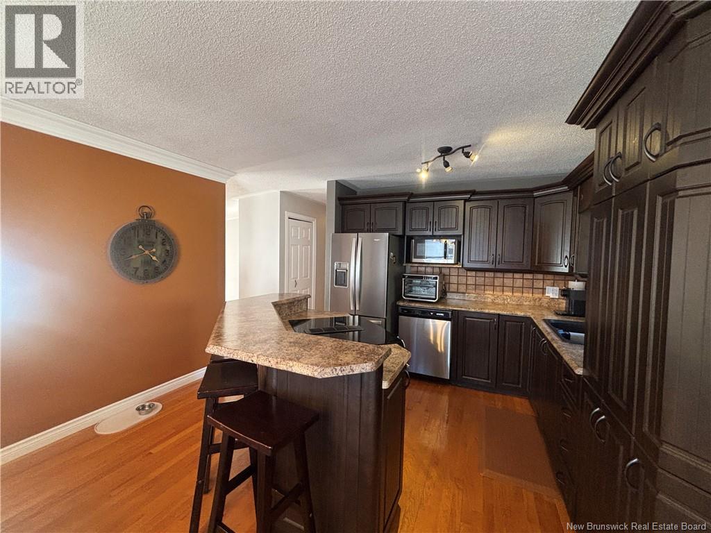 1027 Rue Hache, Beresford, New Brunswick  E8K 1H9 - Photo 31 - NB128277