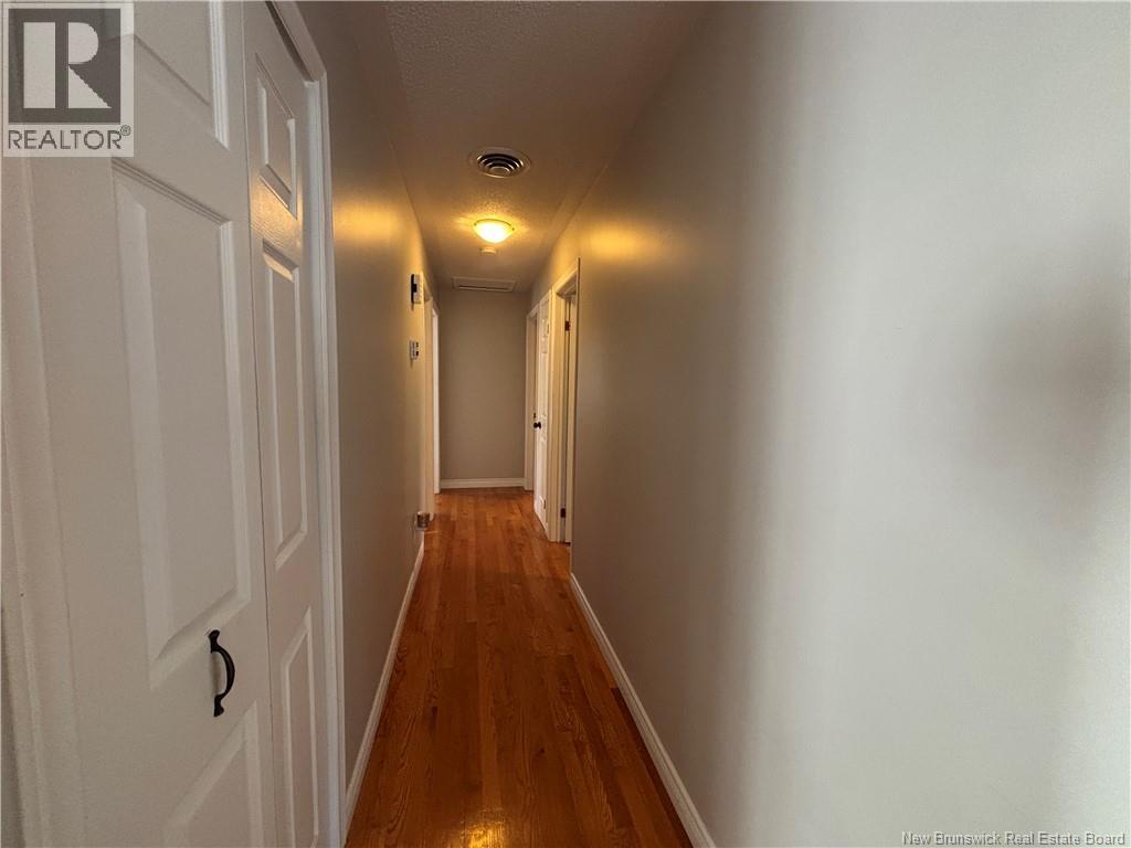 1027 Rue Hache, Beresford, New Brunswick  E8K 1H9 - Photo 32 - NB128277