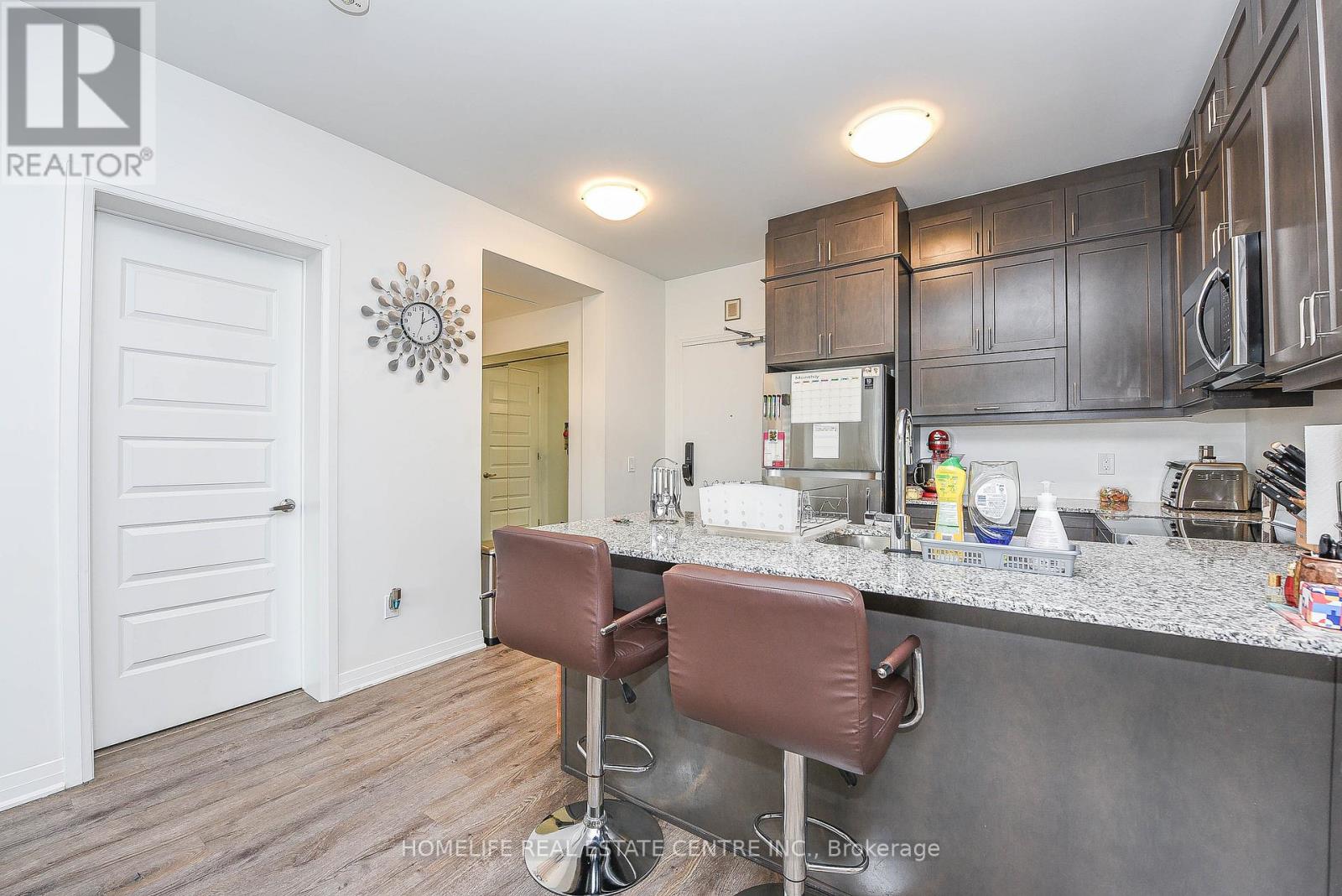 104 - 95 Dundas Street, Oakville, Ontario  L9L 9L9 - Photo 14 - W12454887