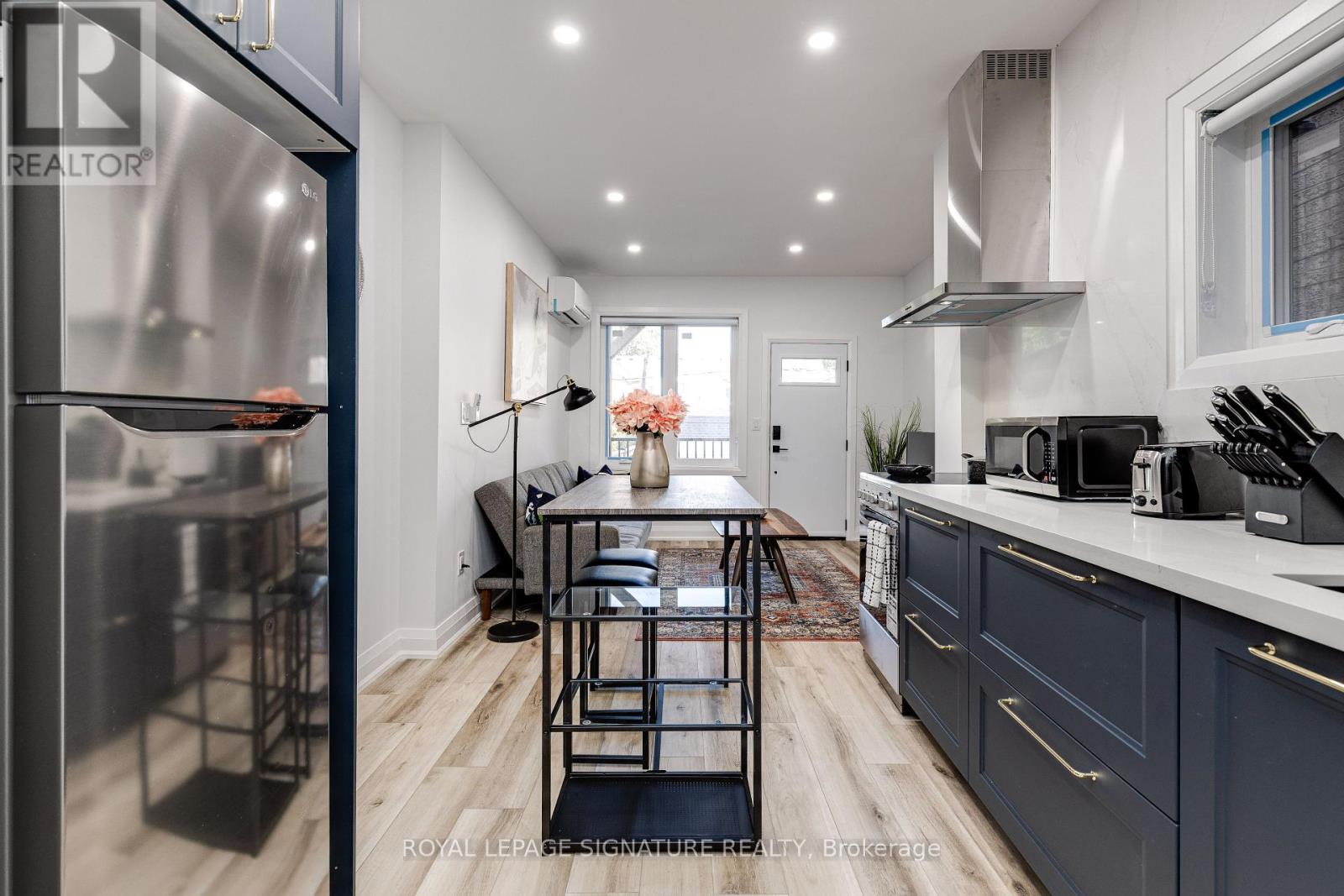 Main - 147 Lansdowne Avenue, Toronto, Ontario  M6K 2W1 - Photo 3 - W12454897