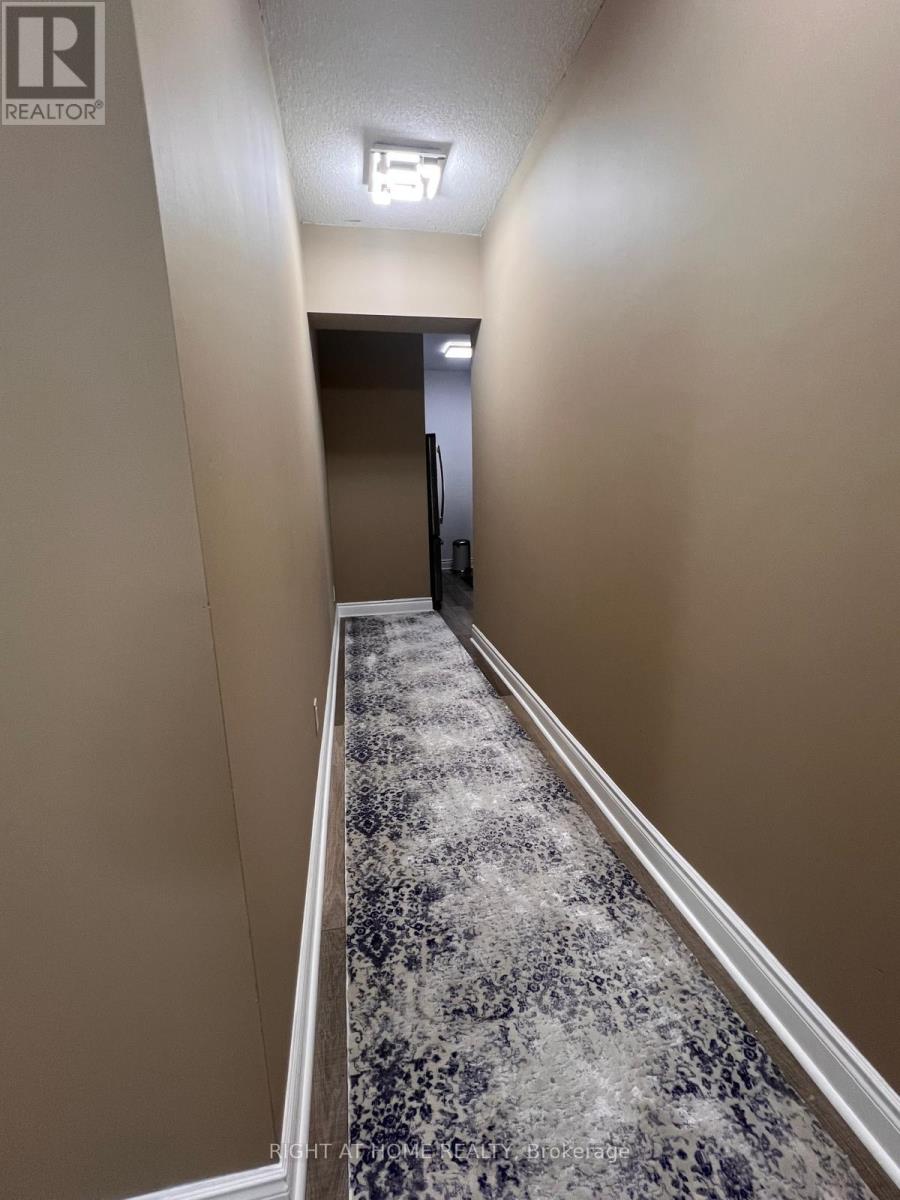 216 - 16 Brookers Lane, Toronto, Ontario  M8V 0A5 - Photo 2 - W12455065