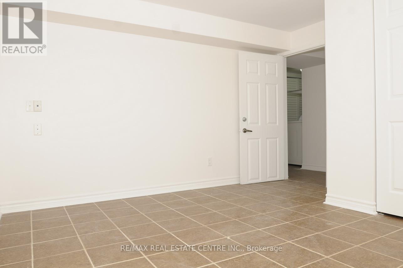 Lower Level - 22 Hollister Road, Toronto, Ontario  M9C 4M7 - Photo 6 - W12454802