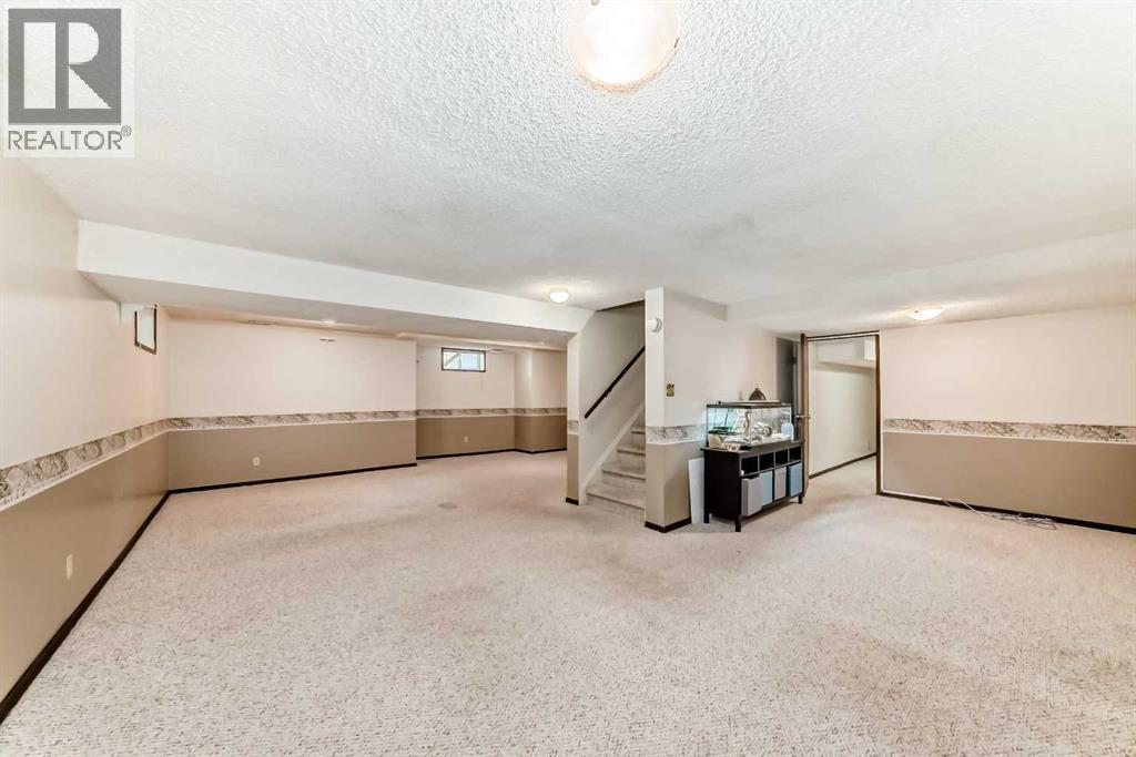 28 Woodfield Court Sw, Calgary, Alberta  T2W 3W5 - Photo 32 - A2260211