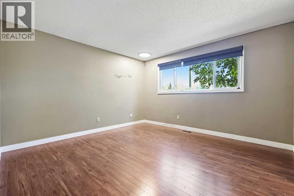 256 Cedarpark Drive Sw, Calgary, Alberta  T2W 2J4 - Photo 5 - A2262983
