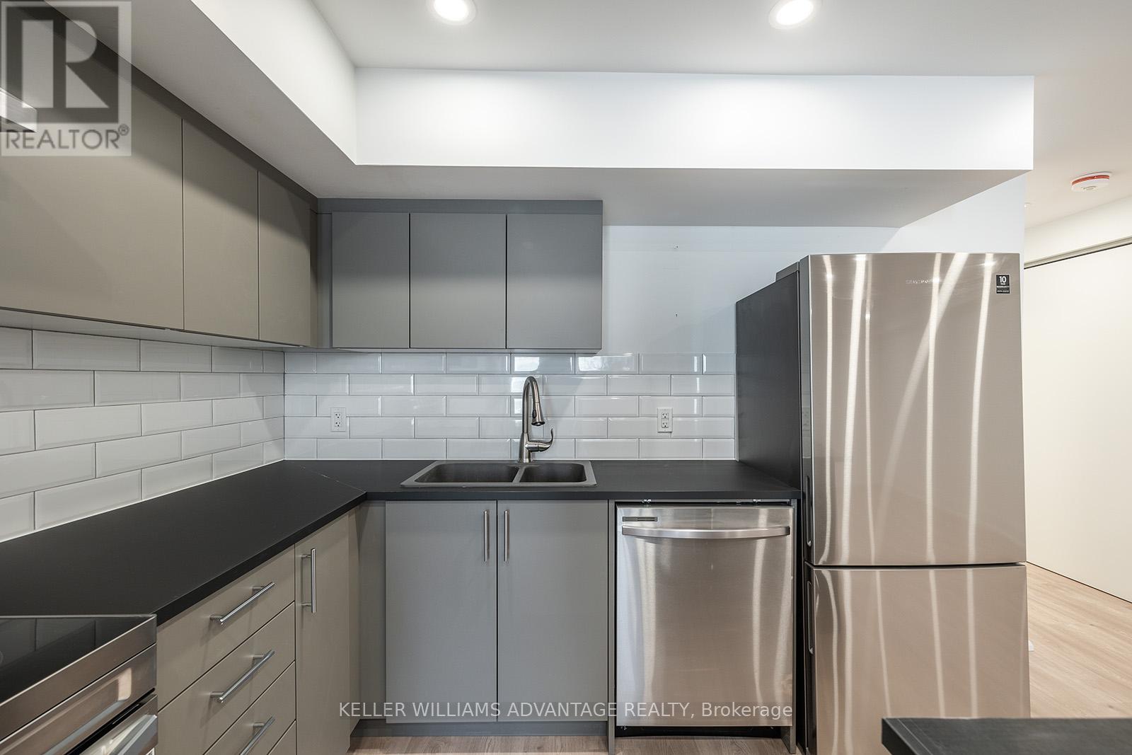 Lower - 40 Sarah Ashbridge Avenue, Toronto, Ontario  M4L 3Y9 - Photo 6 - E12455178