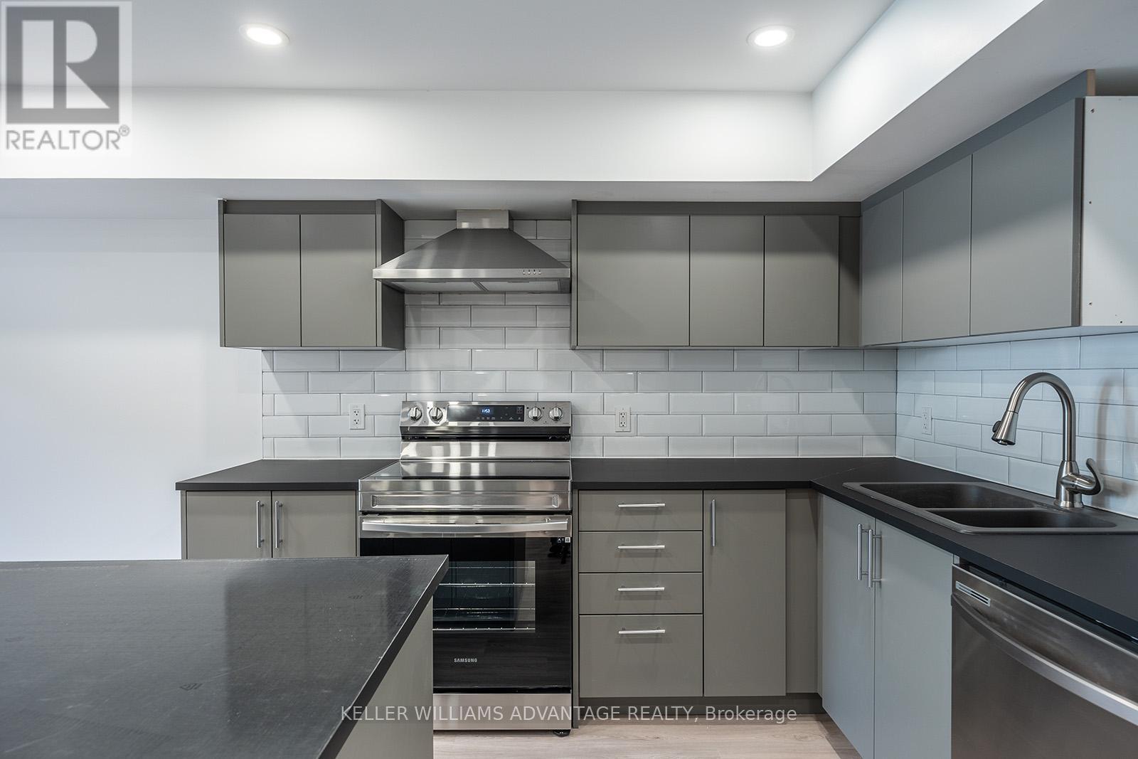 Lower - 40 Sarah Ashbridge Avenue, Toronto, Ontario  M4L 3Y9 - Photo 7 - E12455178