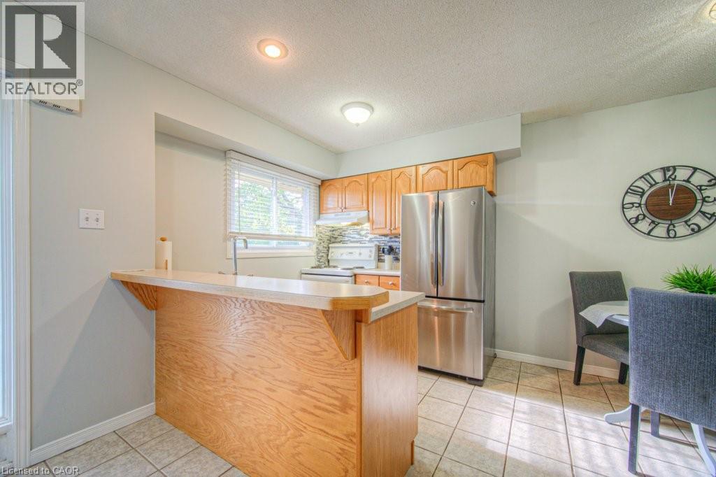 211 Veronica Drive Unit# 10, Kitchener, Ontario  N2A 2R8 - Photo 3 - 40777091
