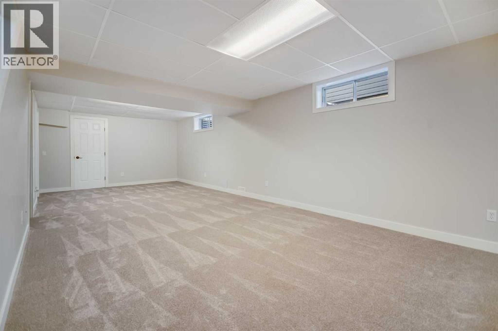 92 Woodford Drive Sw, Calgary, Alberta  T2W 4C3 - Photo 36 - A2258739