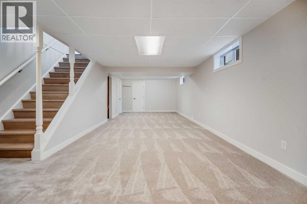 92 Woodford Drive Sw, Calgary, Alberta  T2W 4C3 - Photo 32 - A2258739