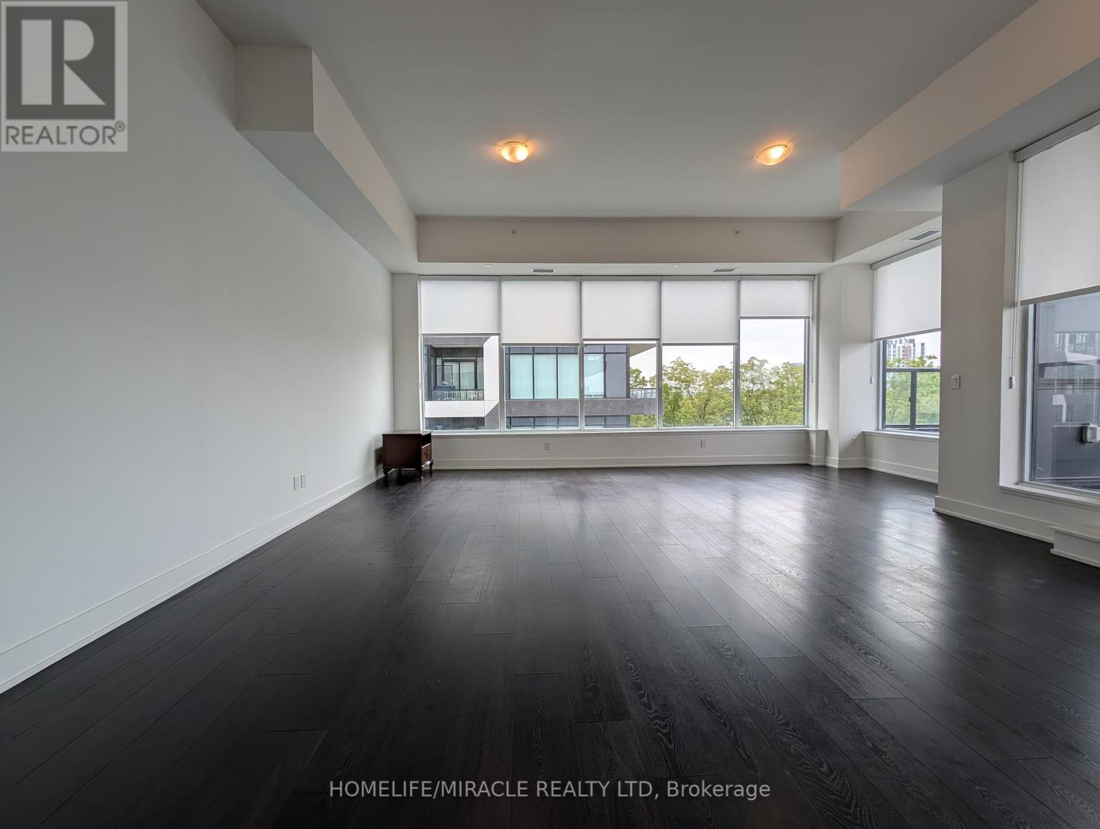 310 - 297 Oak Walk Drive, Oakville, Ontario  L6H 6Z3 - Photo 12 - W12455346