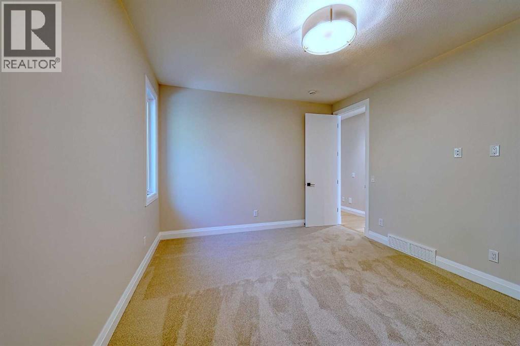 5944 Bow Crescent Nw, Calgary, Alberta  T3B 2B9 - Photo 36 - A2251697
