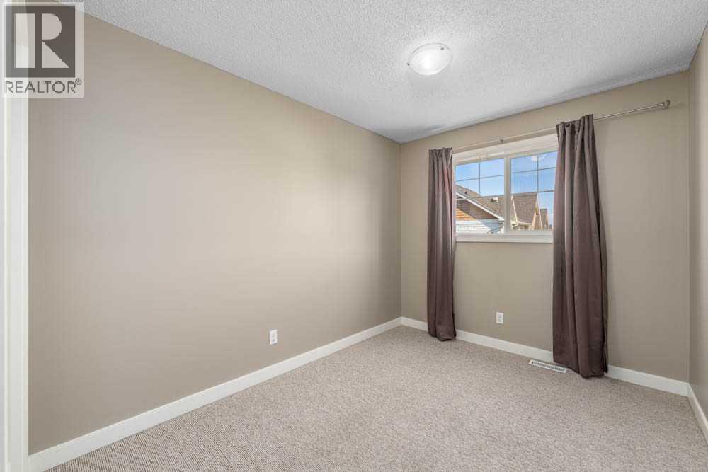 181 Pantego Lane Nw, Calgary, Alberta  T3K 0T1 - Photo 19 - A2261301
