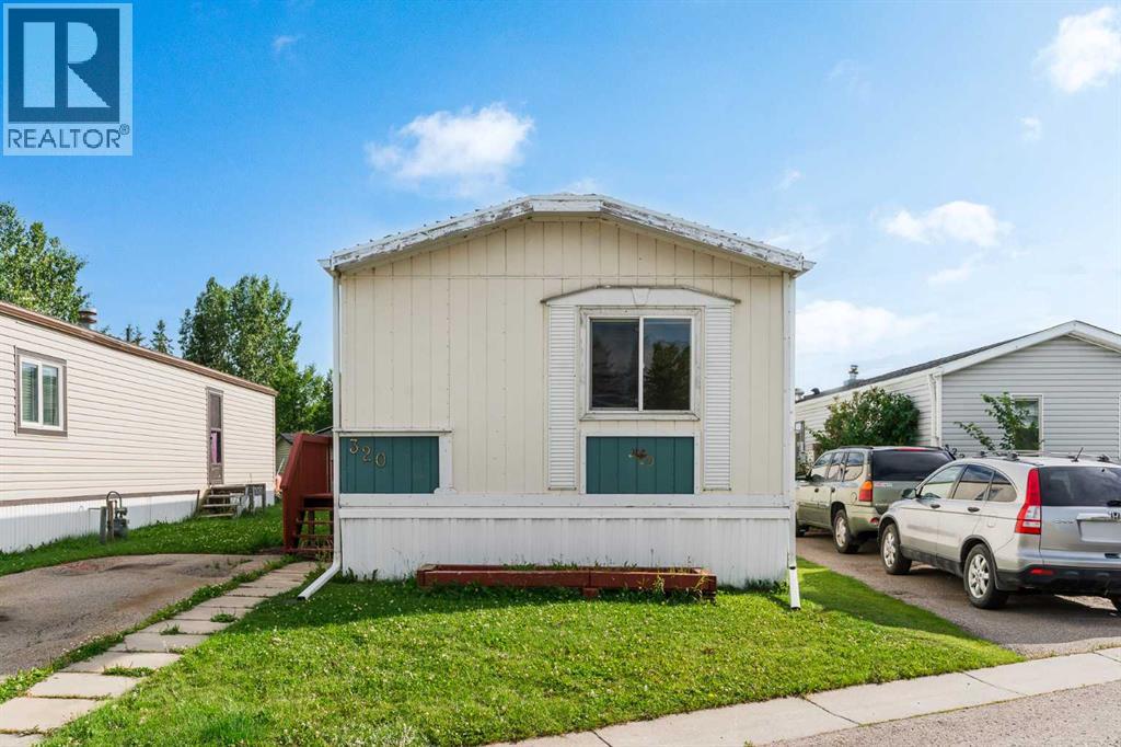 320, 1101 84 Street Ne, Calgary, Alberta  T2A 7X2 - Photo 1 - A2243573