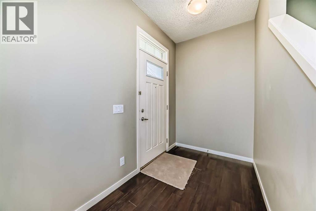 238 Panatella Walk Nw, Calgary, Alberta  T3K 0Z4 - Photo 2 - A2263394