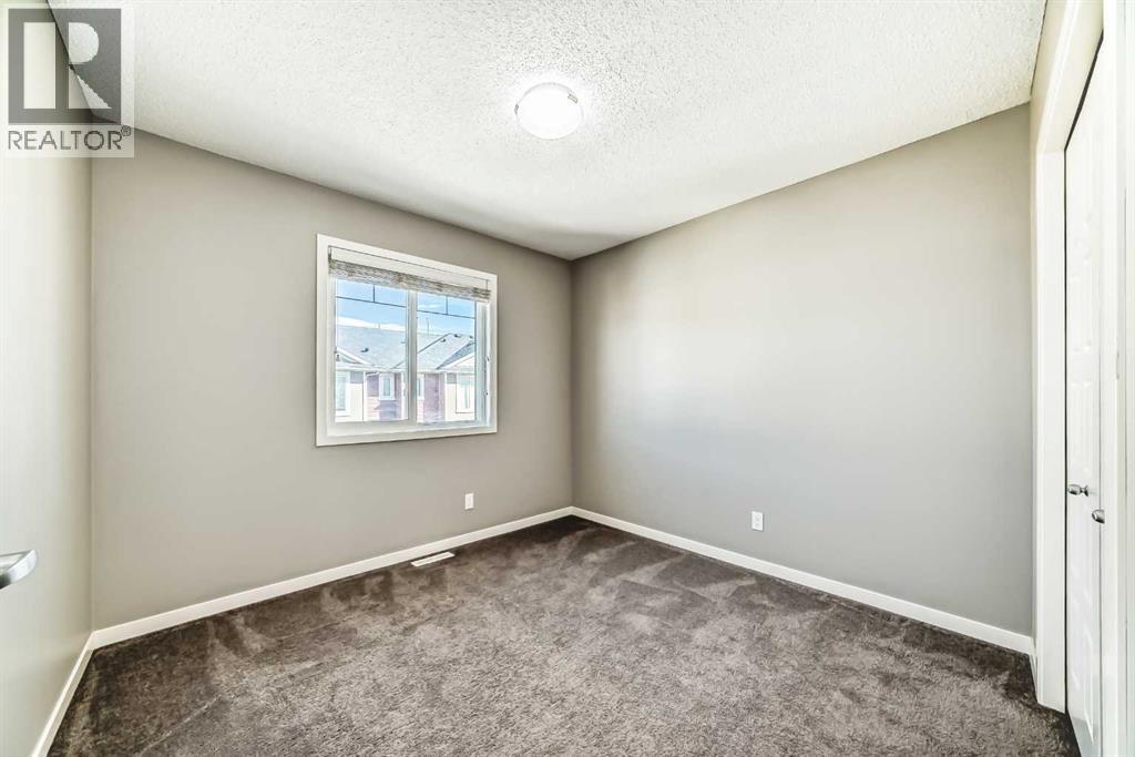 238 Panatella Walk Nw, Calgary, Alberta  T3K 0Z4 - Photo 19 - A2263394