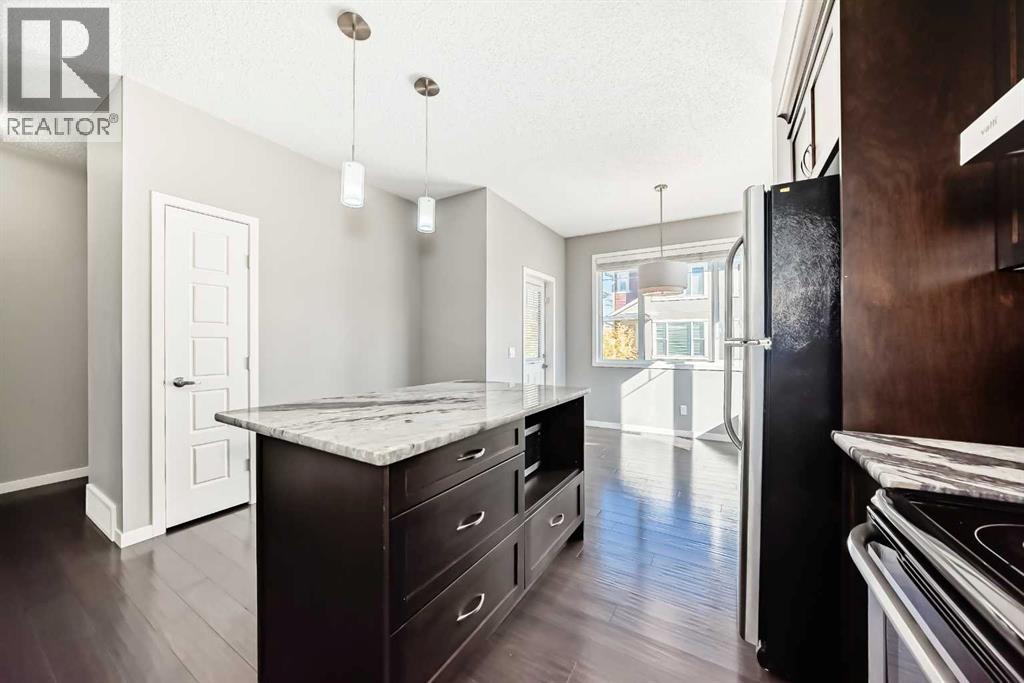 238 Panatella Walk Nw, Calgary, Alberta  T3K 0Z4 - Photo 4 - A2263394