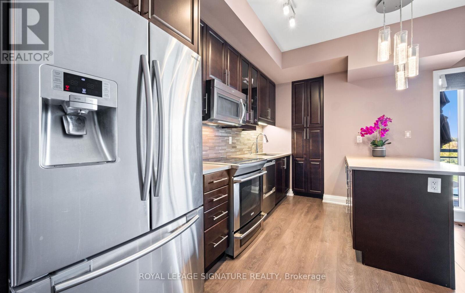 413 - 128 Garden Drive, Oakville, Ontario  L6K 0H7 - Photo 13 - W12455421