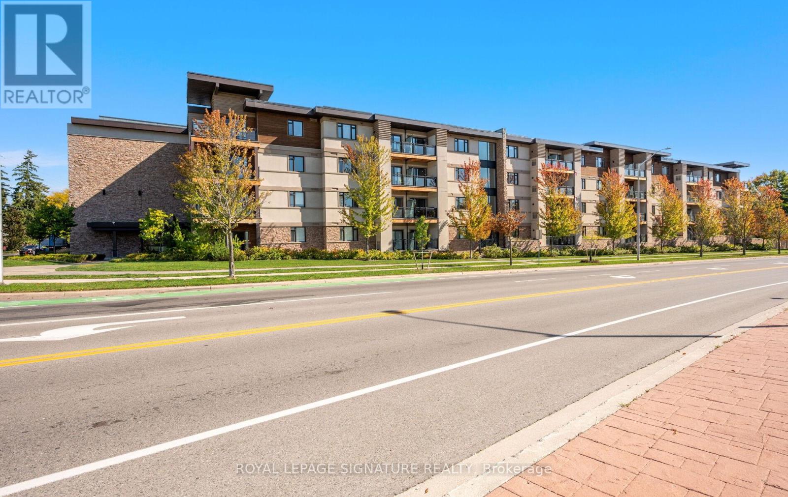 413 - 128 Garden Drive, Oakville, Ontario  L6K 0H7 - Photo 2 - W12455421