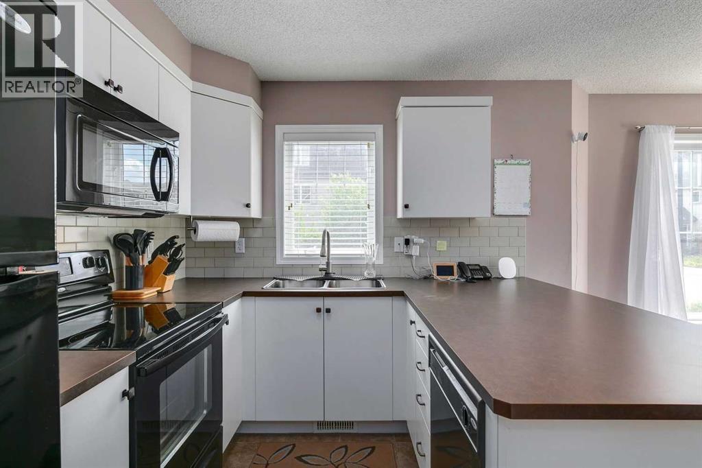 2 Windstone Lane Sw, Airdrie, Alberta  T4B 0N7 - Photo 9 - A2240959