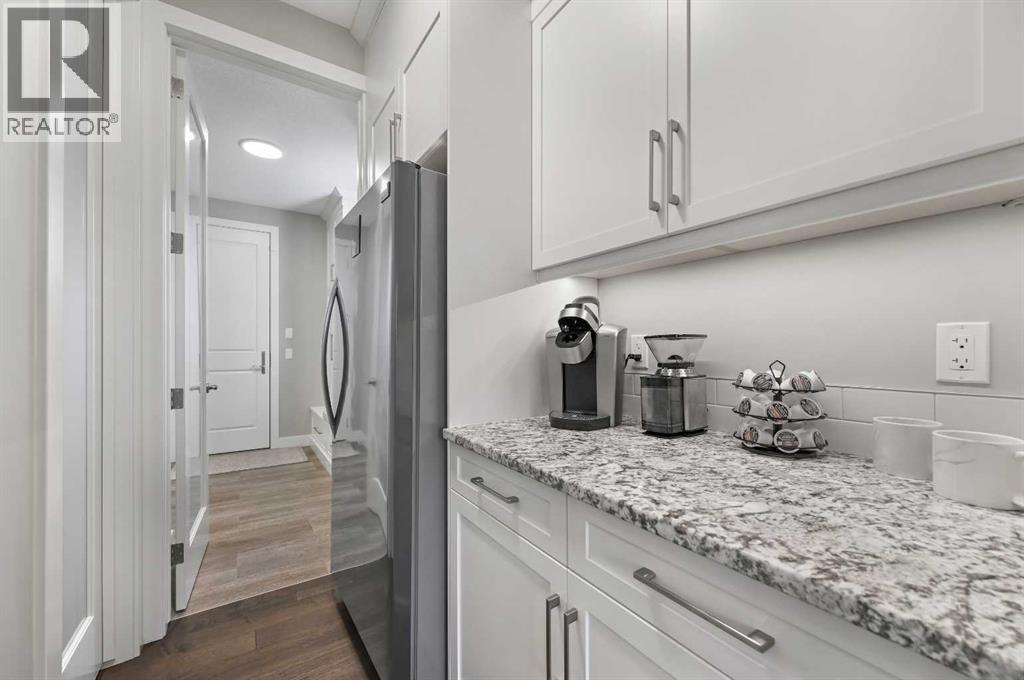 25 Rock Lake Heights Nw, Calgary, Alberta  T3G 0G1 - Photo 18 - A2260980