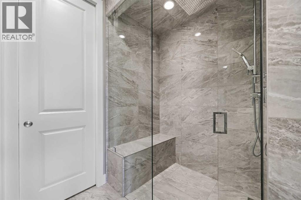 25 Rock Lake Heights Nw, Calgary, Alberta  T3G 0G1 - Photo 27 - A2260980