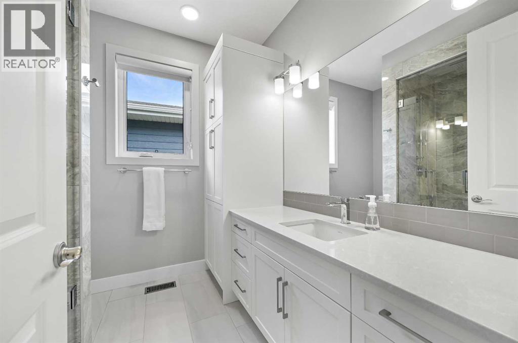 25 Rock Lake Heights Nw, Calgary, Alberta  T3G 0G1 - Photo 34 - A2260980