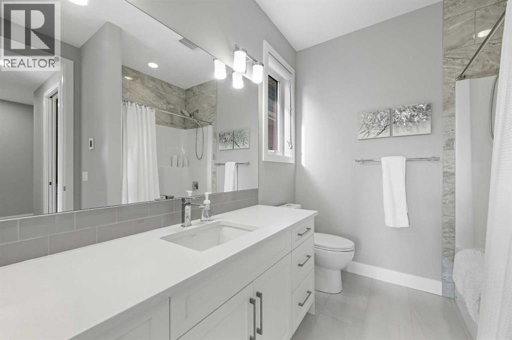 25 Rock Lake Heights Nw, Calgary, Alberta  T3G 0G1 - Photo 31 - A2260980