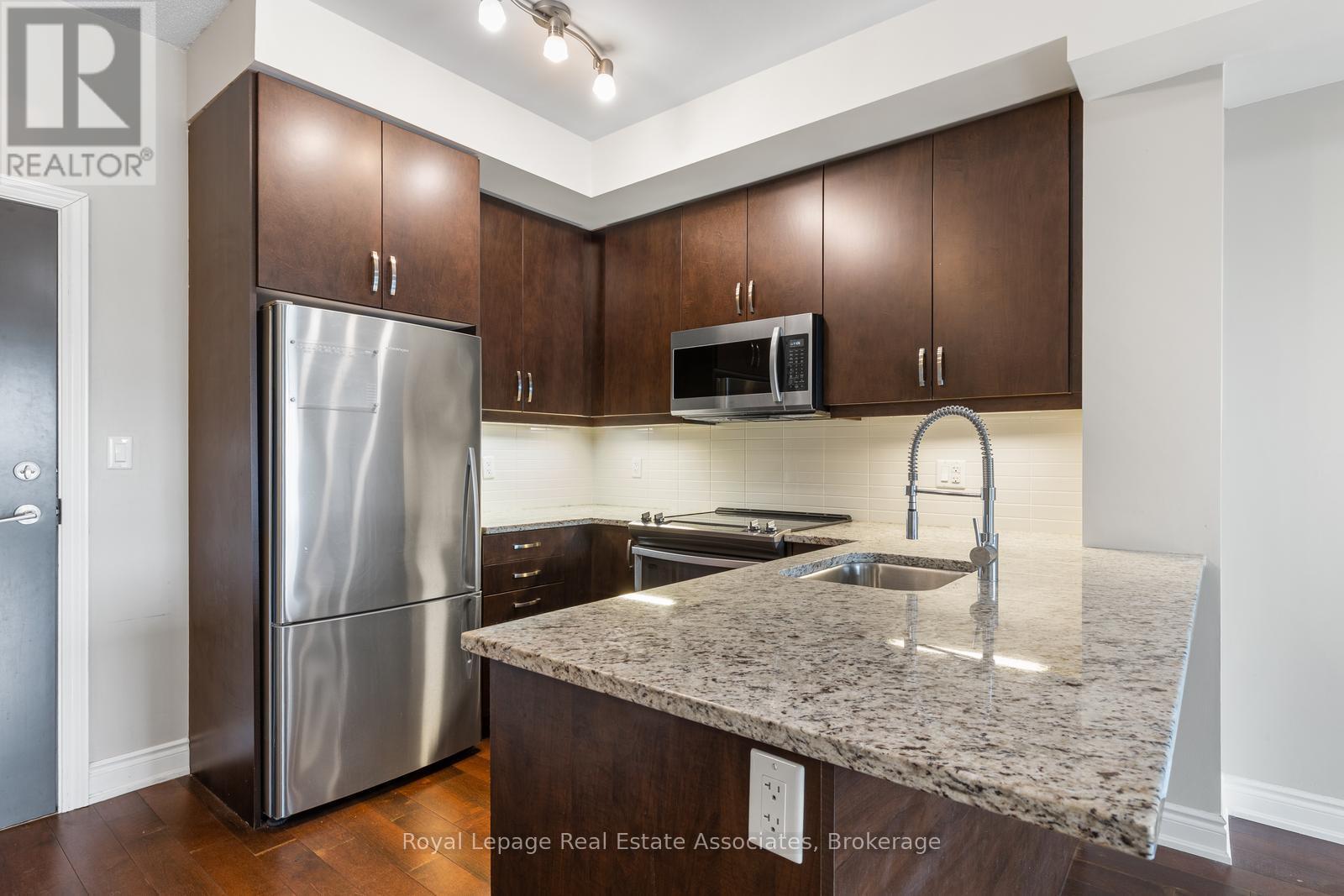 333 - 3170 Erin Mills Parkway, Mississauga, Ontario  L5L 0B6 - Photo 11 - W12455478