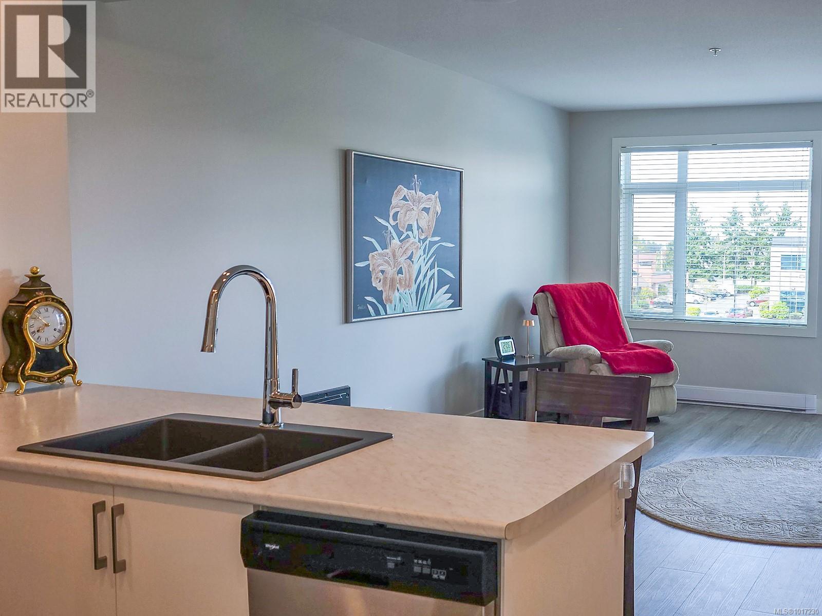 204 6544 Metral Dr, Nanaimo, British Columbia  V9T 2L8 - Photo 2 - 1017230
