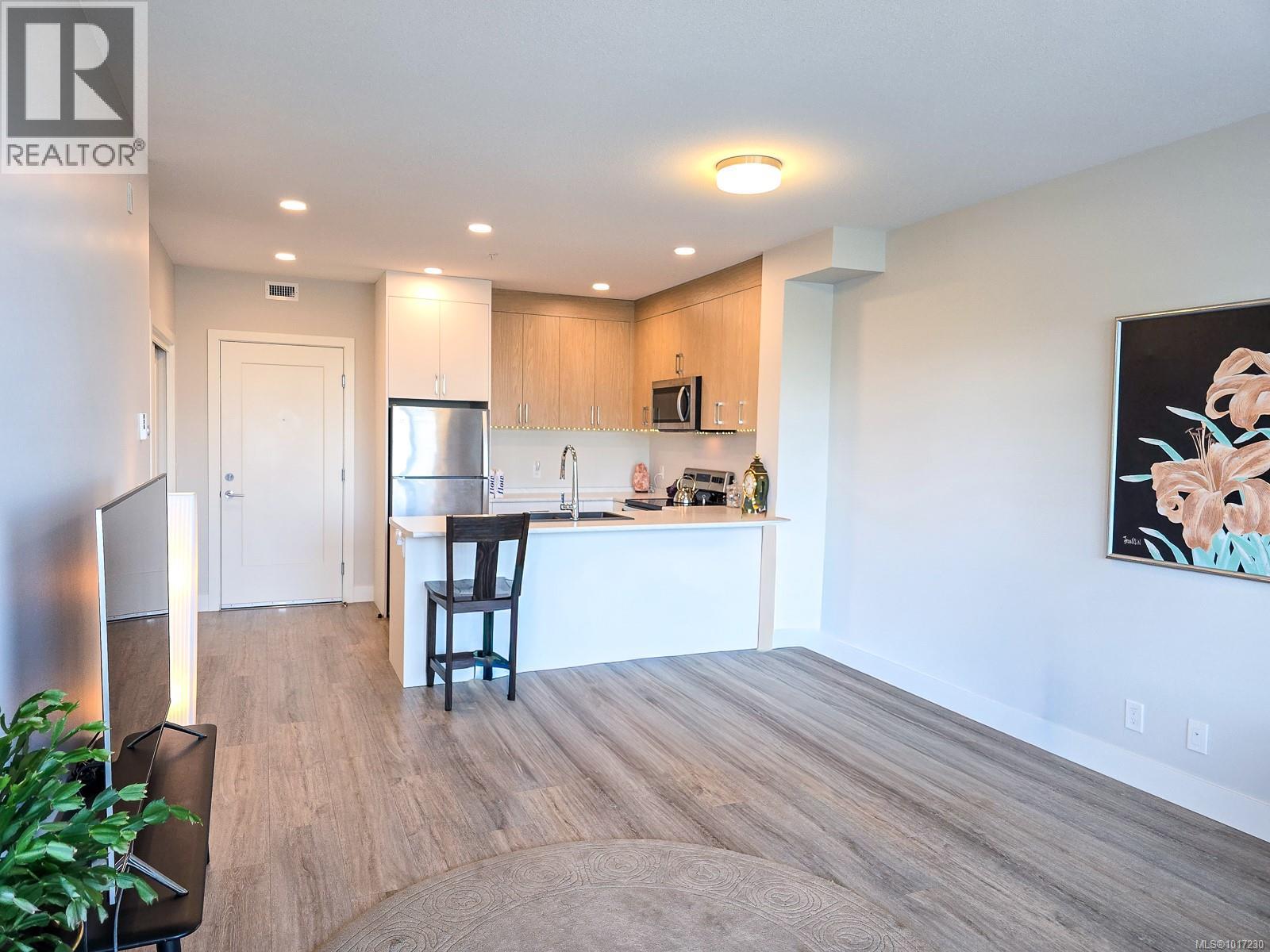 204 6544 Metral Dr, Nanaimo, British Columbia  V9T 2L8 - Photo 7 - 1017230