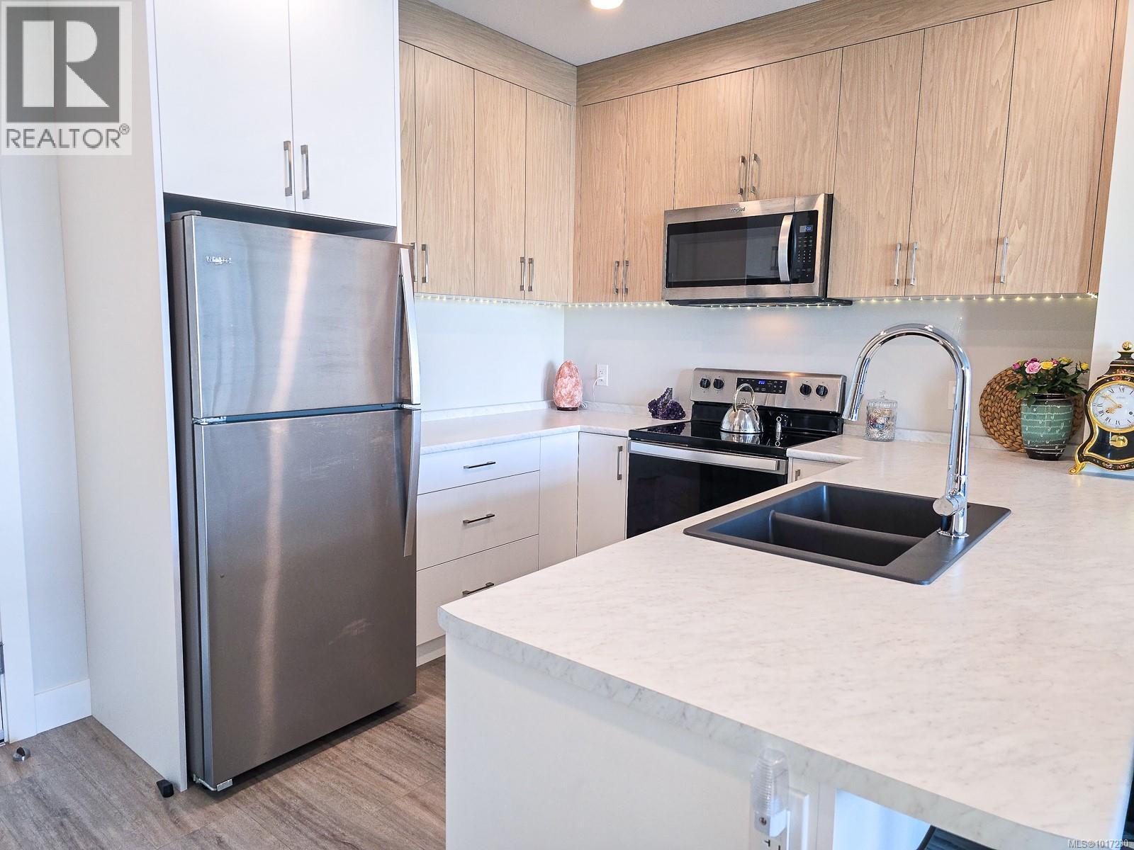 204 6544 Metral Dr, Nanaimo, British Columbia  V9T 2L8 - Photo 9 - 1017230