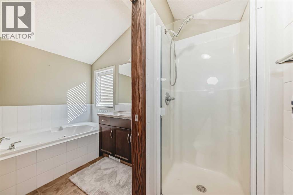 154 New Brighton Lane Se, Calgary, Alberta  T2E 0E2 - Photo 21 - A2259950