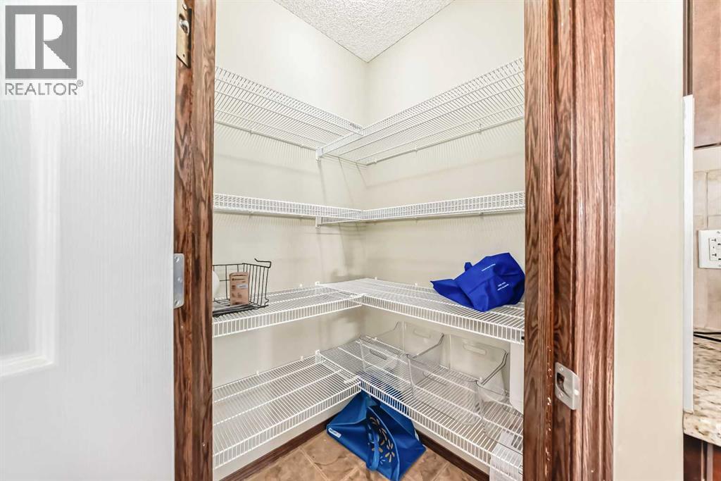 154 New Brighton Lane Se, Calgary, Alberta  T2E 0E2 - Photo 15 - A2259950